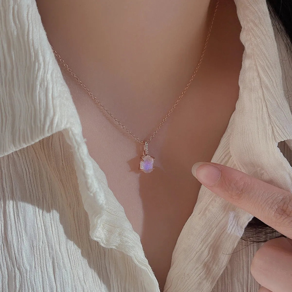 Sterling silver necklace with geometric crystal moonstone pendant on adjustable curb chain