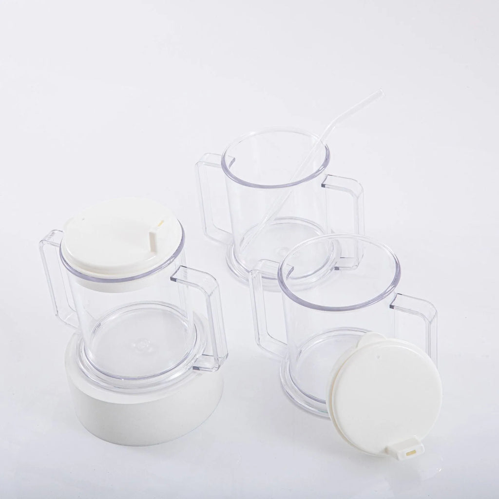Transparent spill-proof plastic drinking cup with modern design on a plain background.