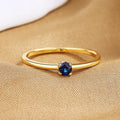Women's geometric copper ring with single diamond in circle design showing colour options