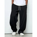 Men's straight-leg casual trousers in black with a micro-elastic drawstring waistband.