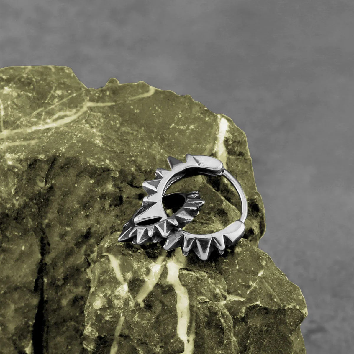 Polished stainless steel round ring earrings with retro design in steel colour