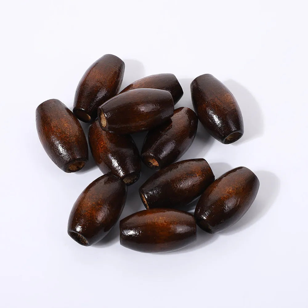 Dark coffee coloured oval M-shaped wooden bead measuring 25mm with a 6mm hole