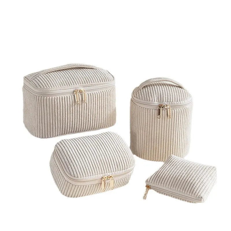 Four cube-style flannelette makeup bags in matching design with colour options including pink dots and khaki