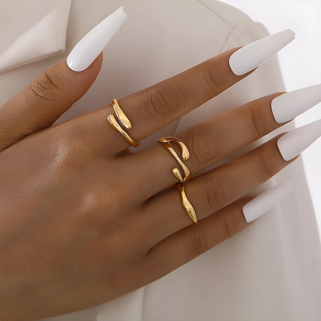 Women's irregular water drop ring suit 3-piece set in gold alloy on white background