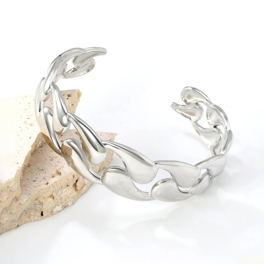 Advanced style stainless steel alloy bracelet in a minimalist European trend design on a wrist.