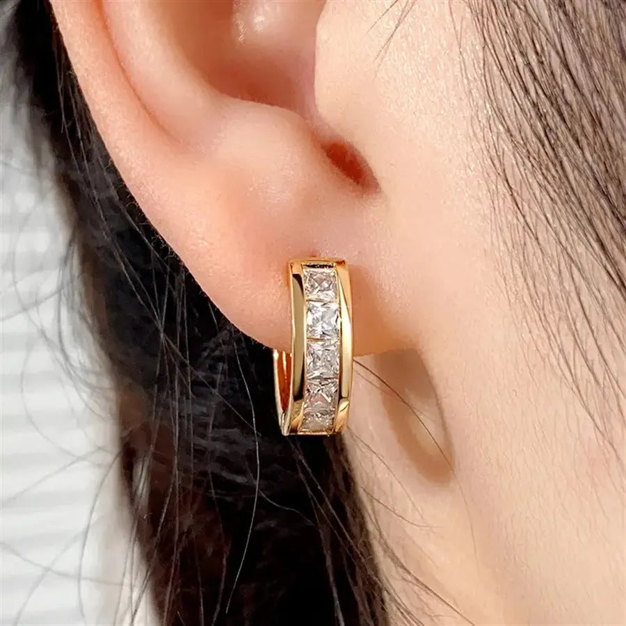 Geometric quadrilateral fashion earrings in gold or silver colours with angular design