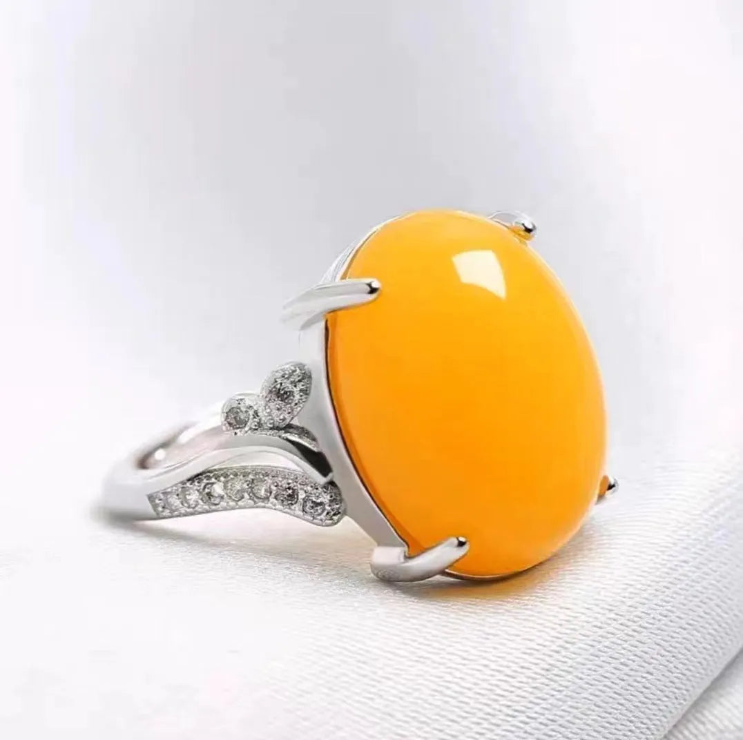 Adjustable ethnic geometric alloy ring showing five colour variations: black, blue, green, red, yellow