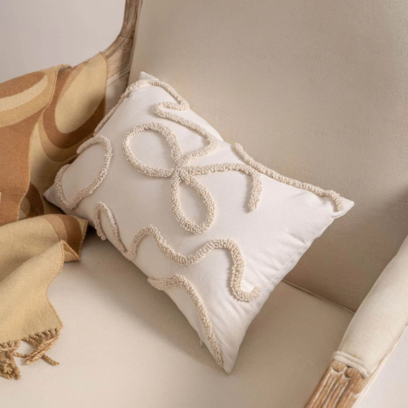Decorative striped cushion cover with knitted tassel in a choice of six patterns and two sizes.