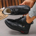 Women's black velvet house slippers with cotton lining and a non-slip rubber sole.