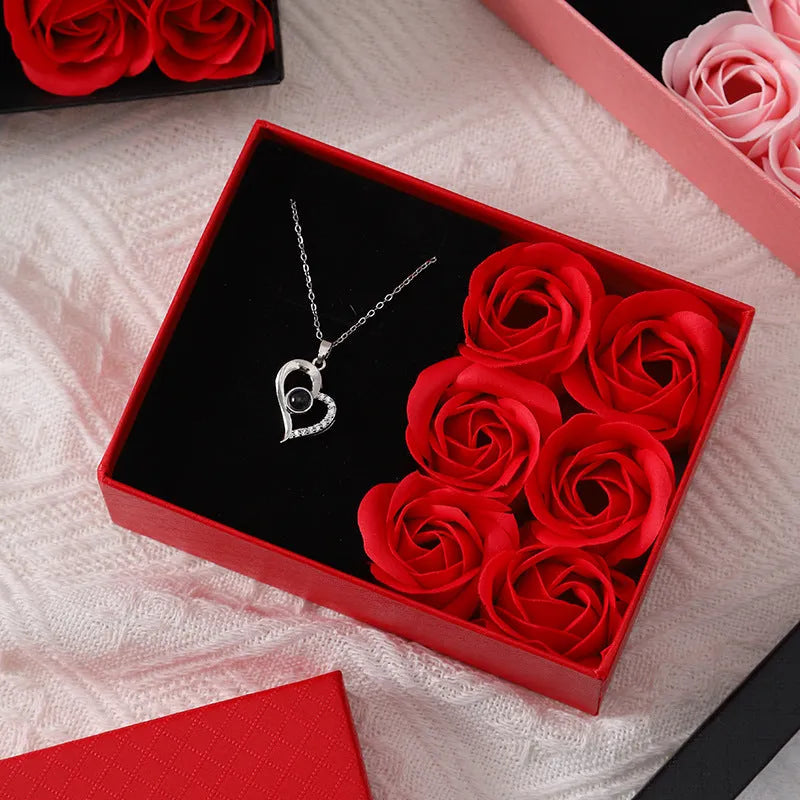 Korean style red gift box containing six pink soap flowers, with a matching handbag.