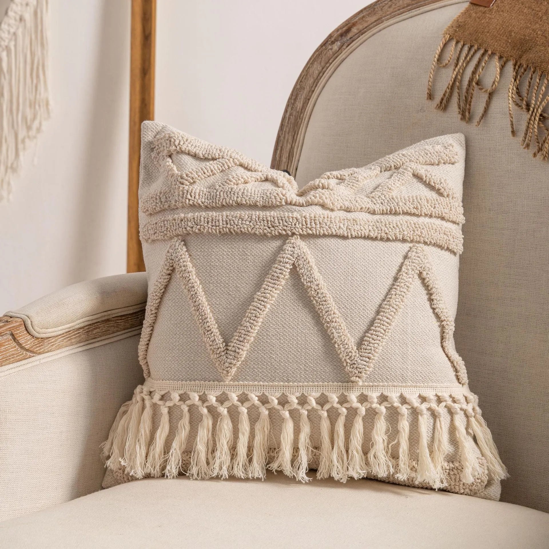 Decorative striped cushion cover with knitted tassel in a choice of six patterns and two sizes.