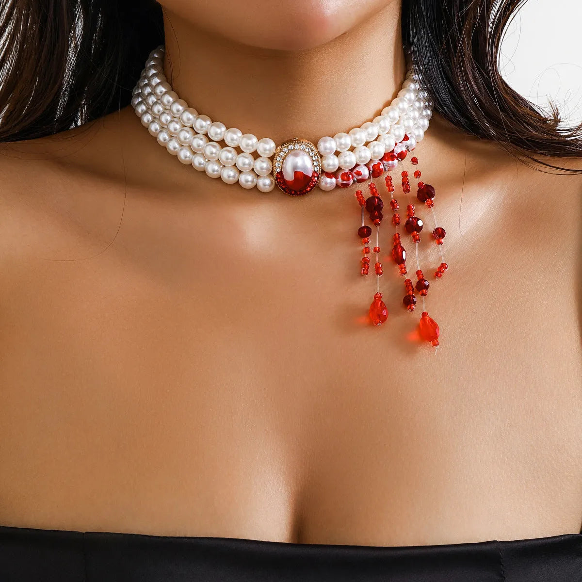 Halloween pearl collar necklace, stud earrings, and bracelet set in electroplated gold finishes.