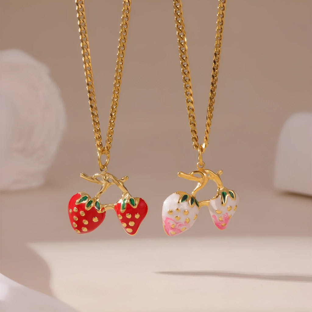 Stainless steel strawberry-shaped pendant necklace on an alloy chain in red or white gradient finish.