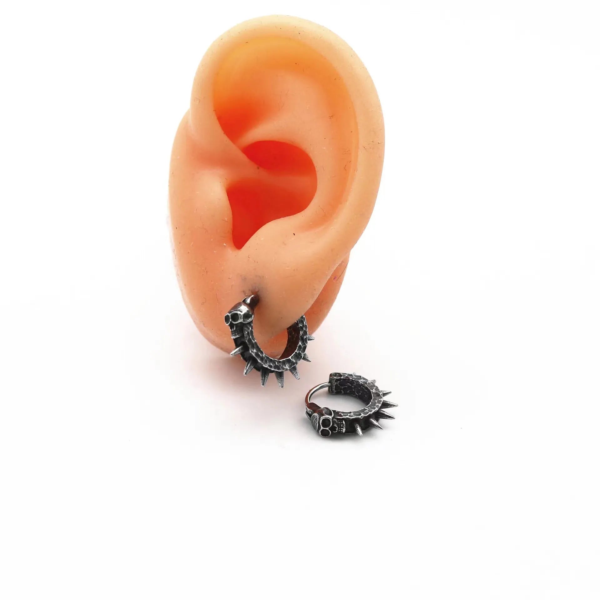 Black geometric motorcycle-shaped stud earrings made from alloy and plastic for punk style.