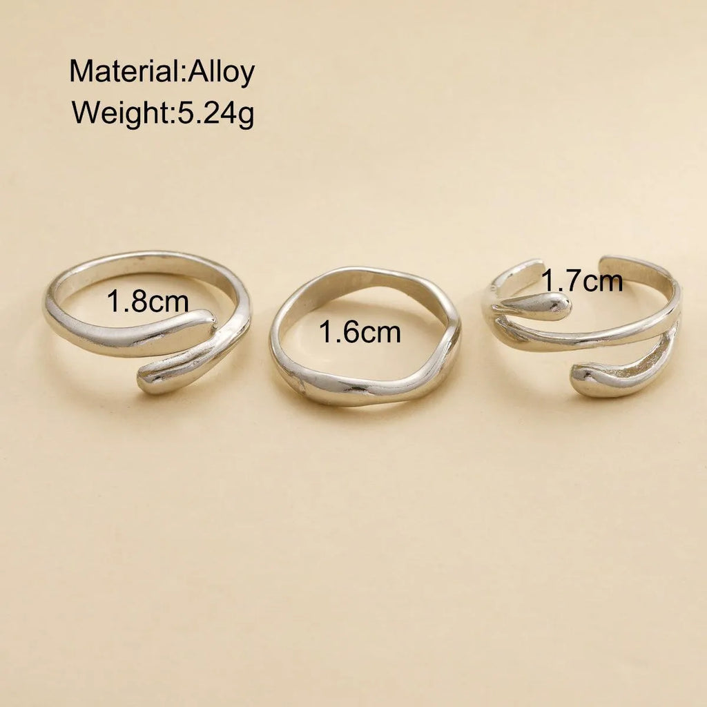 Women's irregular water drop ring suit 3-piece set in gold alloy on white background
