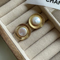 Gold electroplated metal earrings with French retro style and round design for women