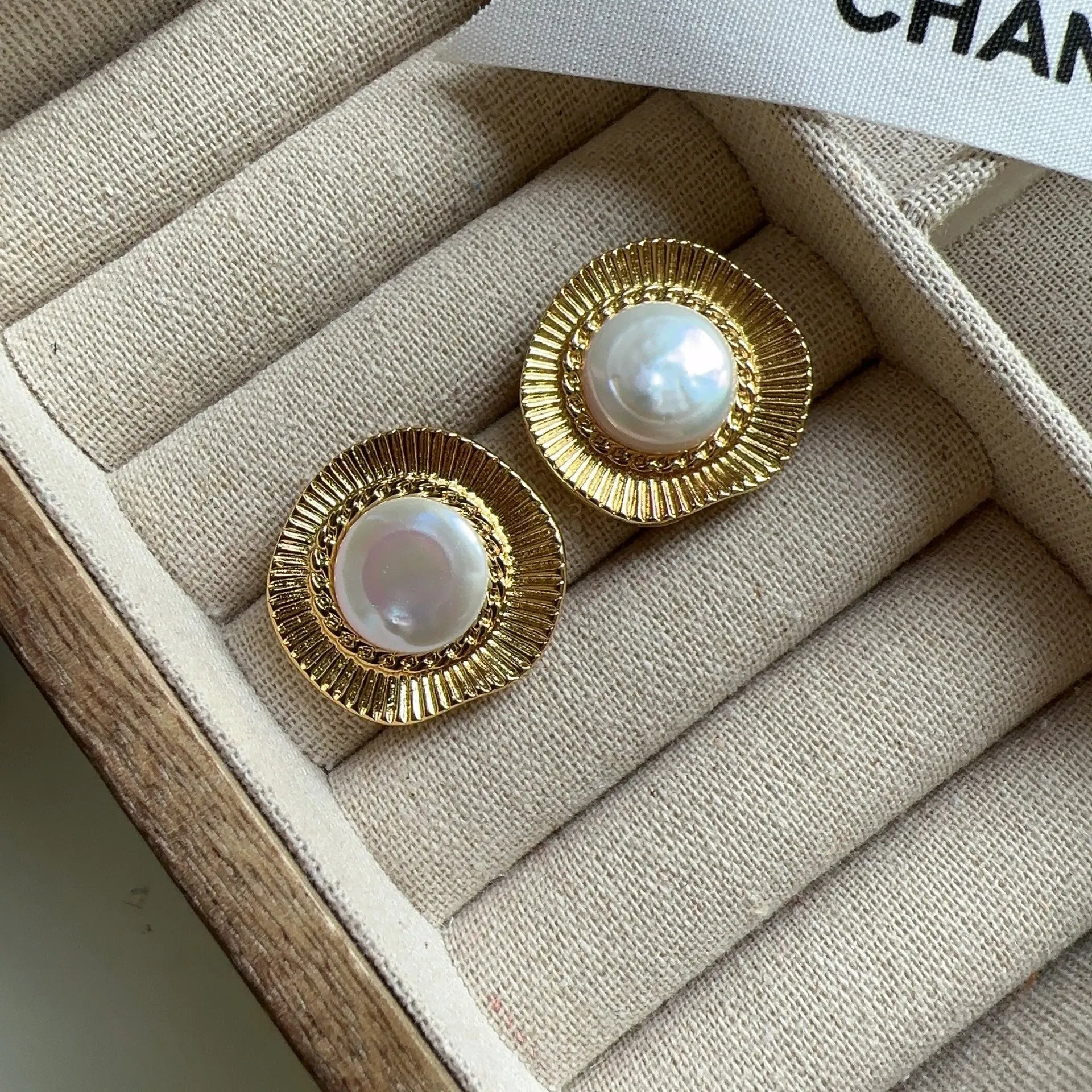 Gold electroplated metal earrings with French retro style and round design for women