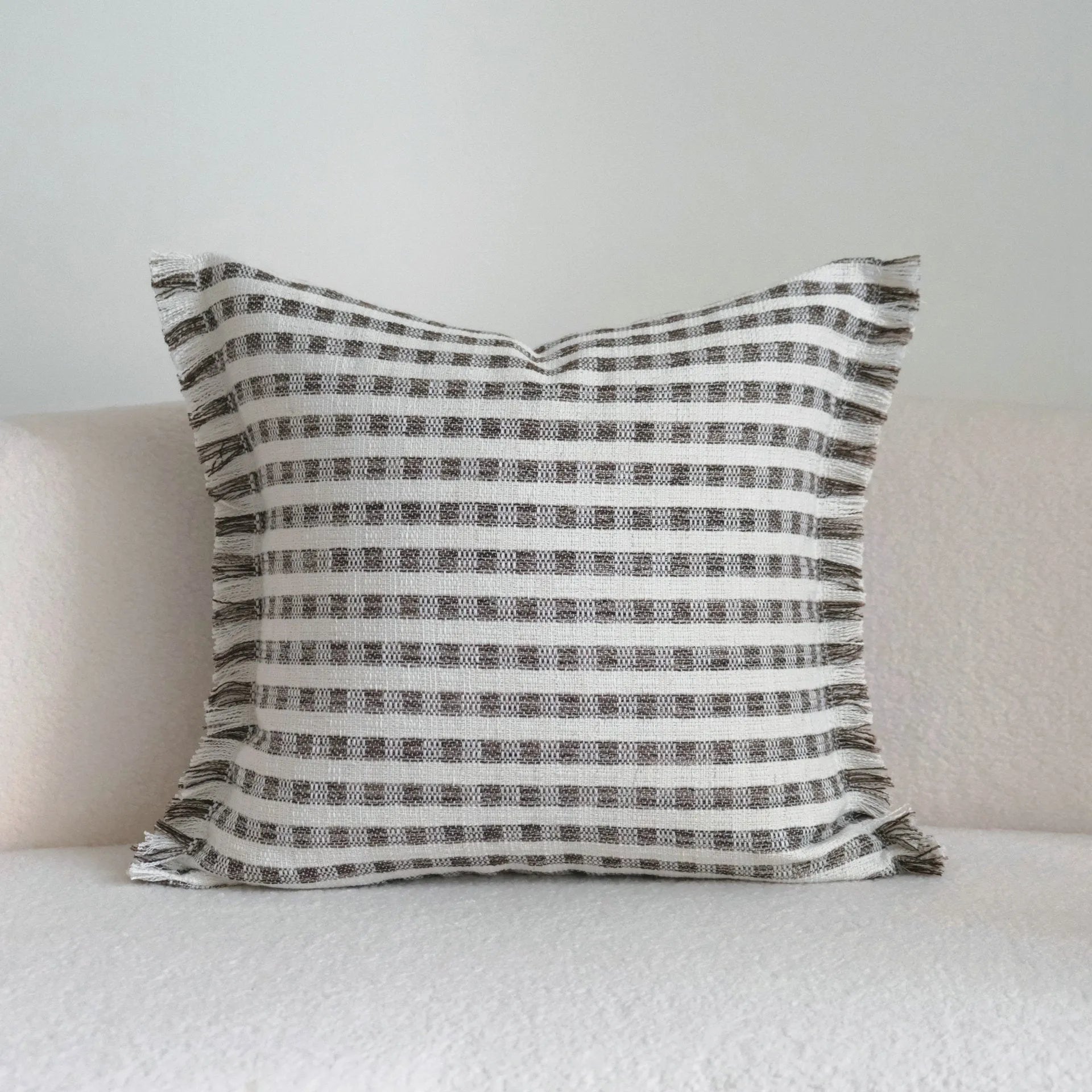 Coffee brown striped mid-century cushion pillow on sofa in square and rectangular sizes