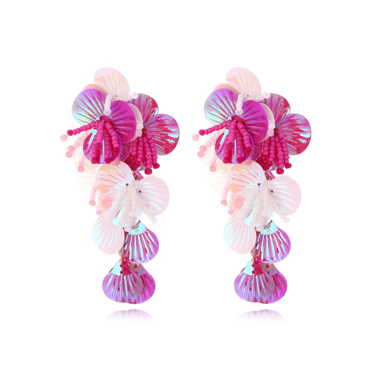 A pair of handmade colourful string bead flower and leaf earrings in an exaggerated design.