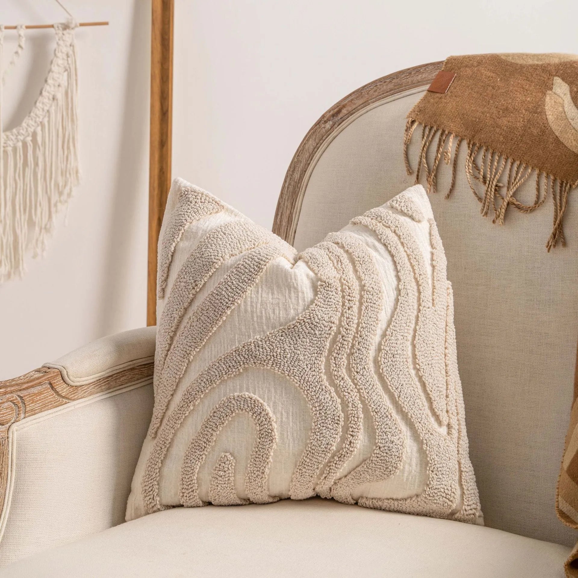 Decorative striped cushion cover with knitted tassel in a choice of six patterns and two sizes.