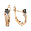 Gold geometric drop shape earrings with black agate stones, retro cold wind style.