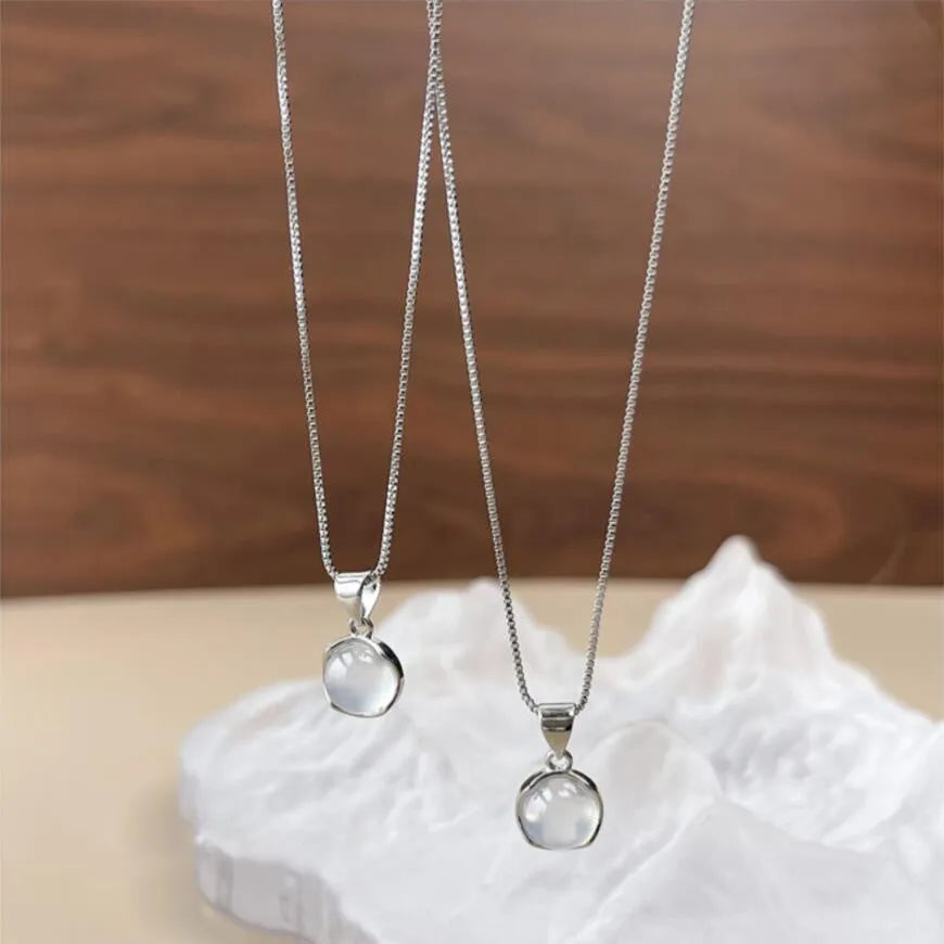 Women's Korean-style simple oval pendant necklace with artificial crystal pendant on box chain in X7 6 Moon Light colour, geometric eight Awn star design