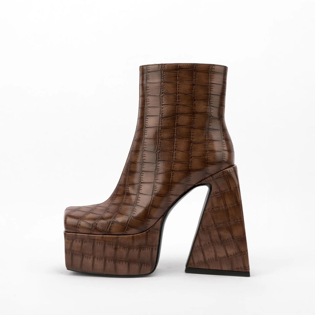 Women's ankle boot with a super high heel in artificial PU material, shown in a solid colour.