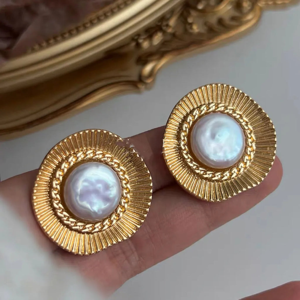 Gold electroplated metal earrings with French retro style and round design for women
