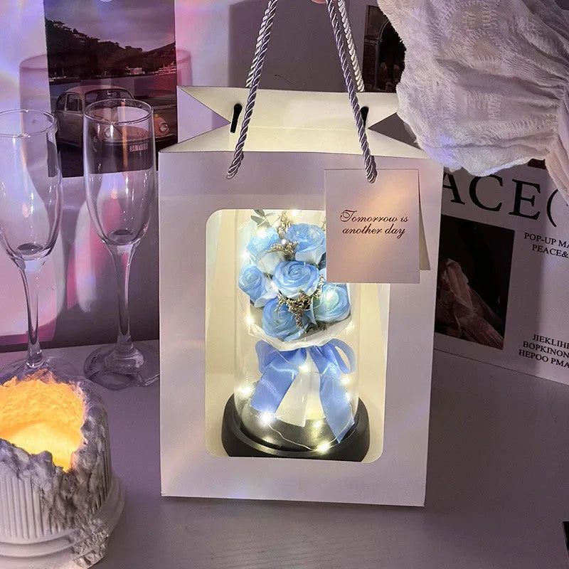 Bionic bouquet artificial flower arrangement in a reusable tote bag, showing gradient blue colour option.