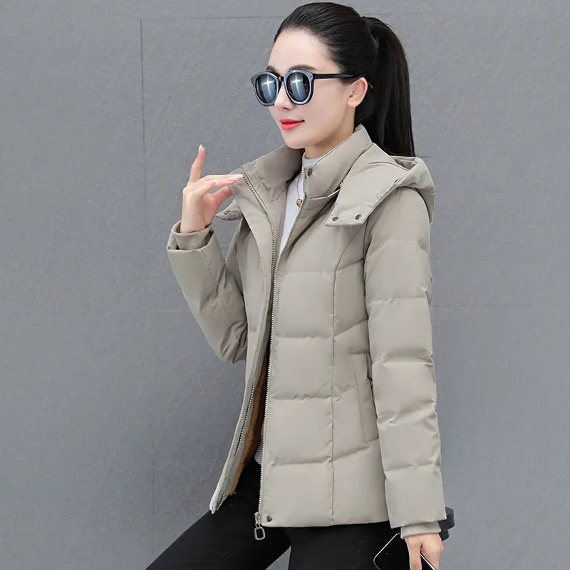 Women's short thick down jacket in black, slim fit with long sleeves and pocket detail