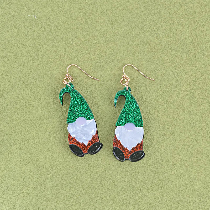 Cartoon Santa Claus character earrings in acrylic with red, green, or mixed hat styles