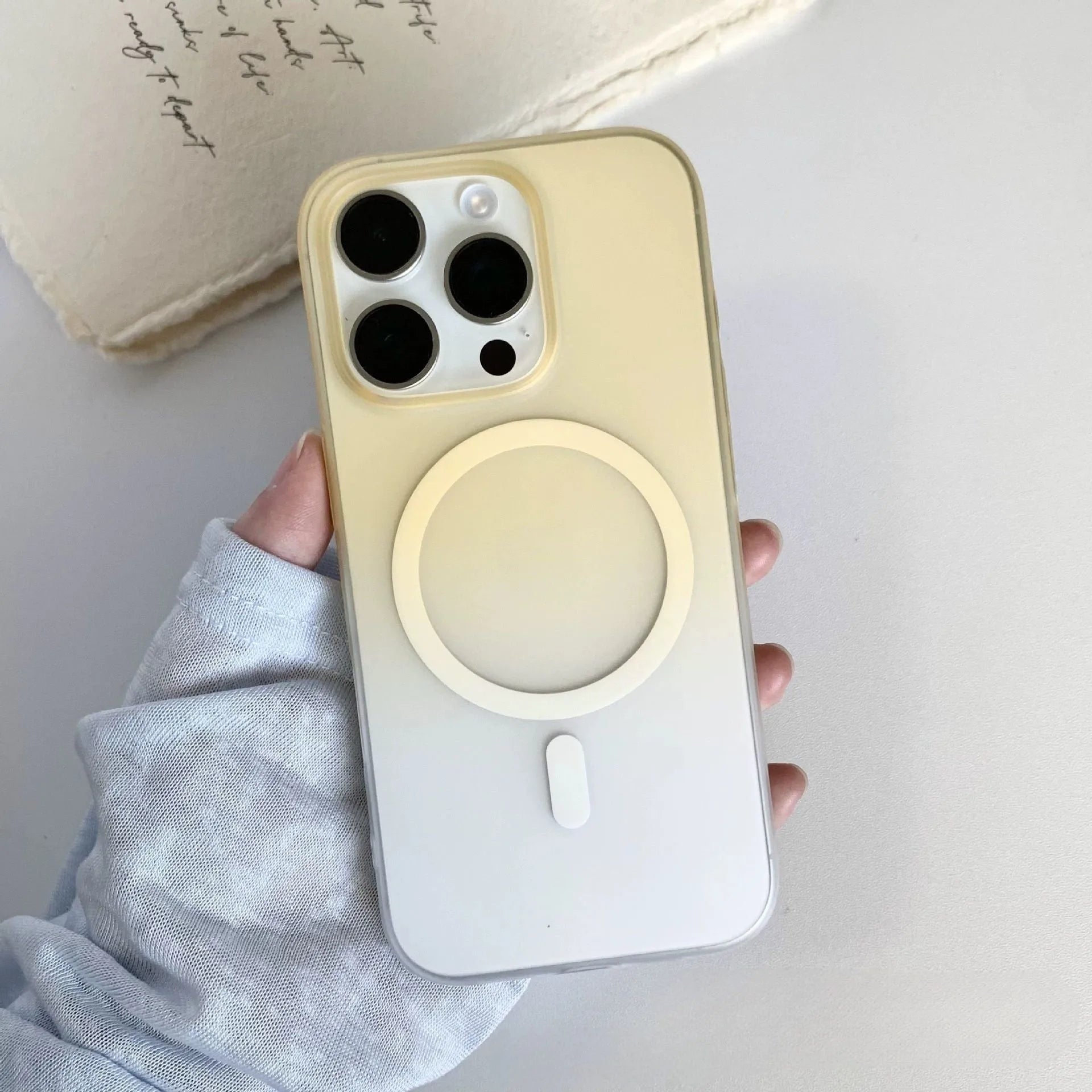 Frosted gradient blue magnetic suction phone case for iPhone, showing ultra-thin PC construction.