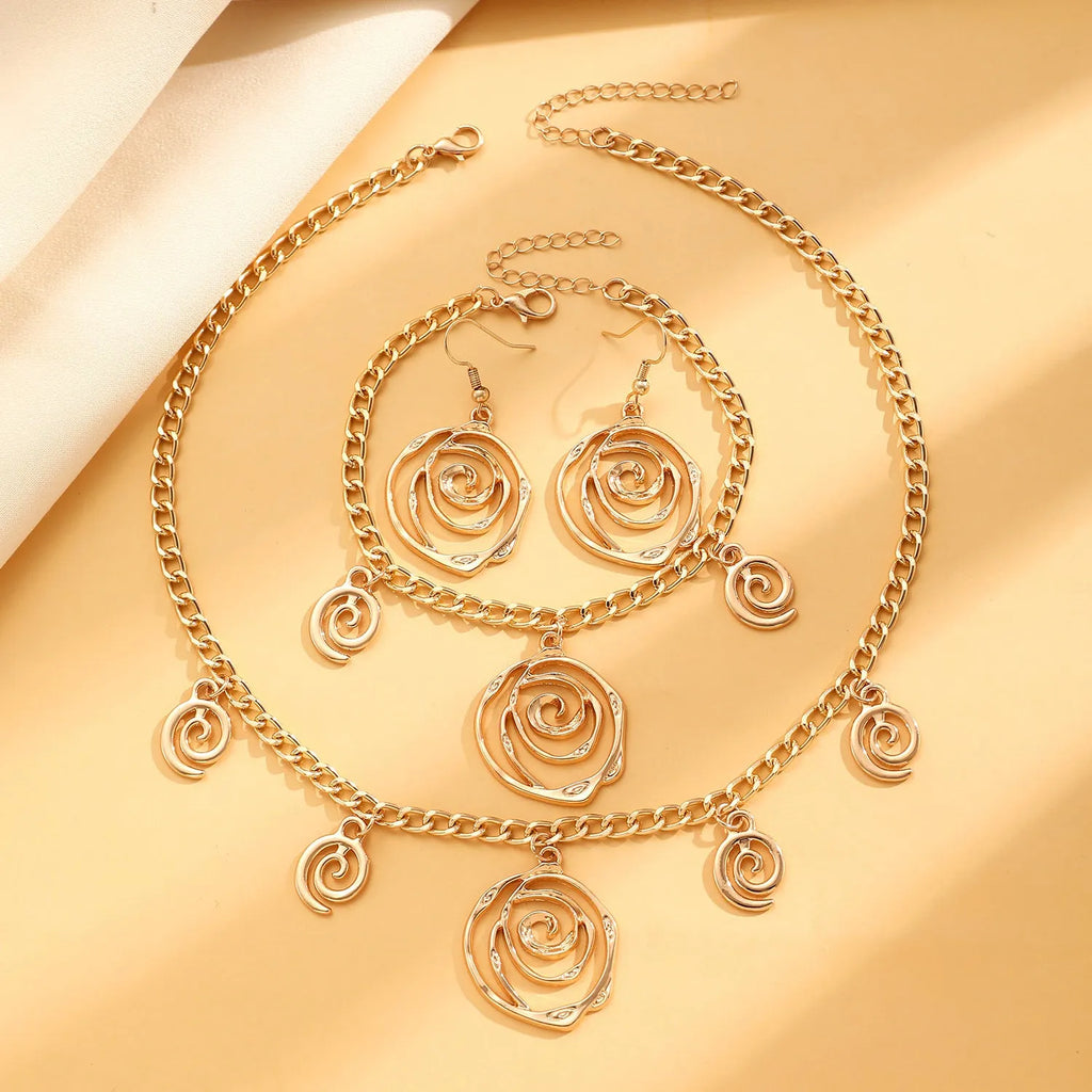 Spiral donut design jewellery set with necklace, bracelet and earrings in gold electroplated alloy