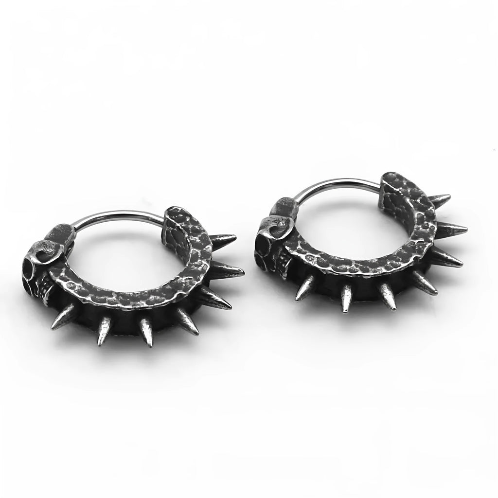 Black geometric motorcycle-shaped stud earrings made from alloy and plastic for punk style.