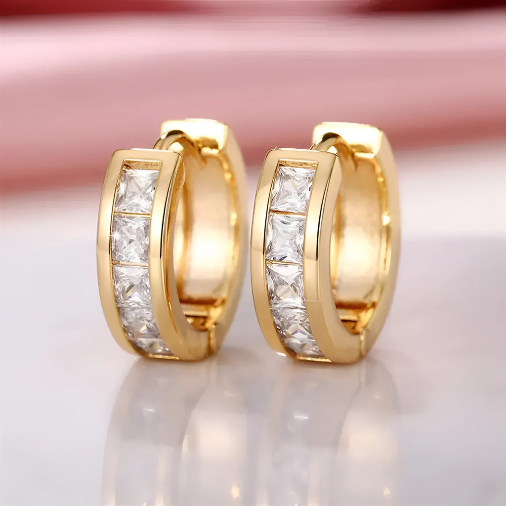 Geometric quadrilateral fashion earrings in gold or silver colours with angular design