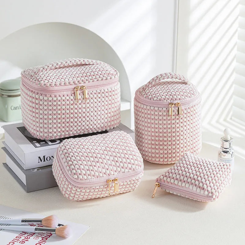 Four cube-style flannelette makeup bags in matching design with colour options including pink dots and khaki