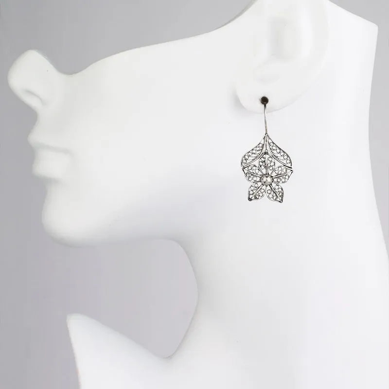 Silver hollow flower leaf-shaped women's earrings with geometric openwork floral pattern