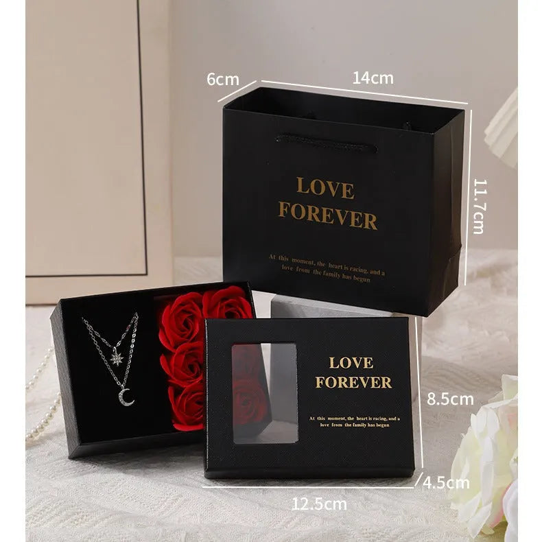 Korean style red gift box containing six pink soap flowers, with a matching handbag.