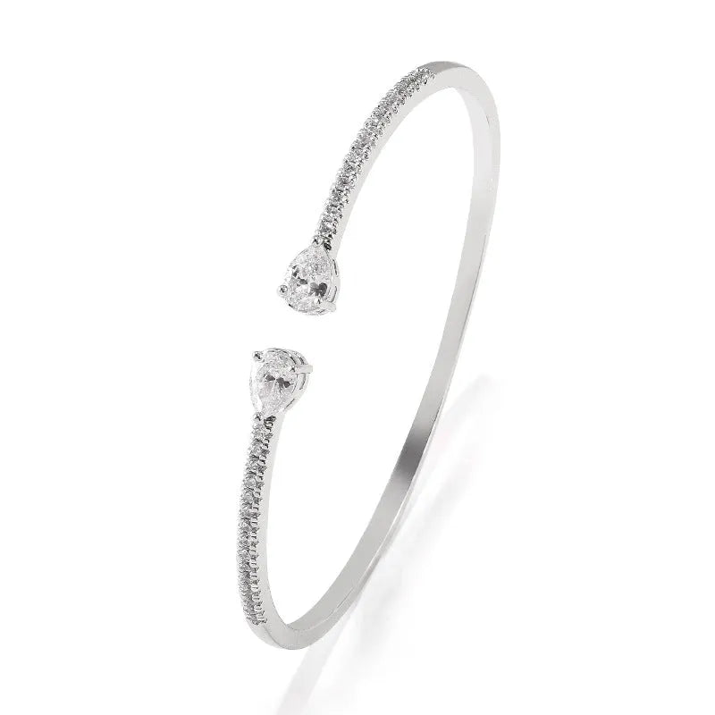 Copper personalised bracelet with multi-zircon inlay detail in white or blue colour