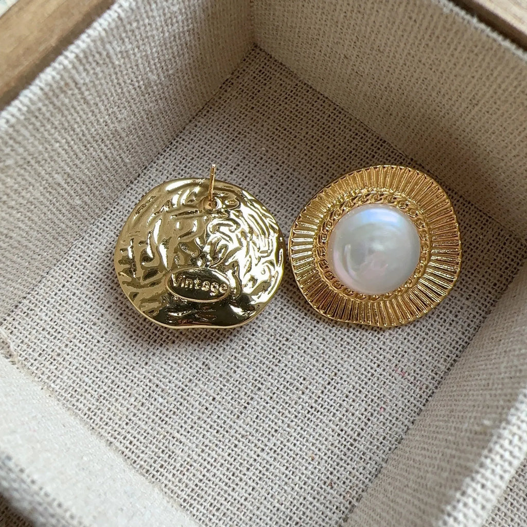 Gold electroplated metal earrings with French retro style and round design for women