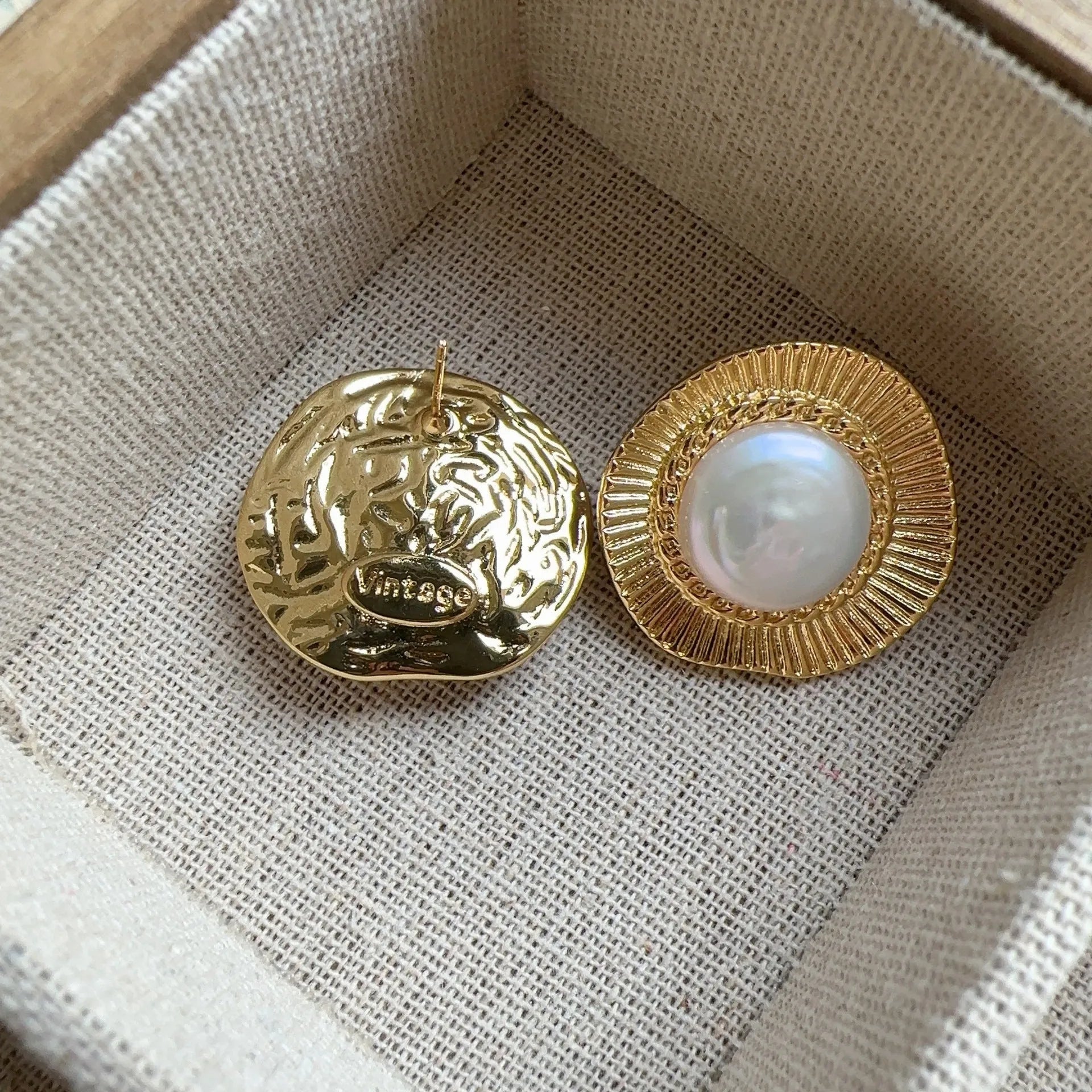 Gold electroplated metal earrings with French retro style and round design for women