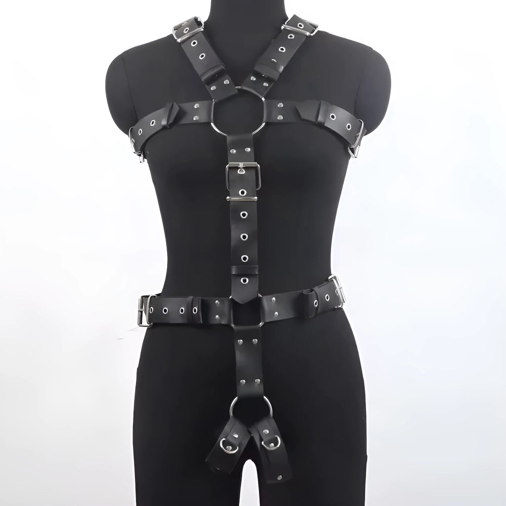 Black patent leather finish shapewear bodysuit with thin straps and a front pin buckle closure.