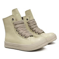 Black high-top leather sneakers with side zipper and round toe on a platform sole.