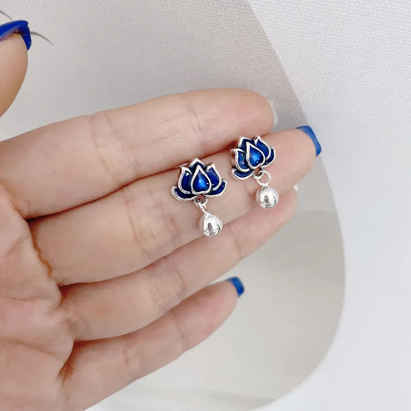 Blue lotus earrings with retro artistic design and lotus seedpod tassel, measuring 1.2cm wide