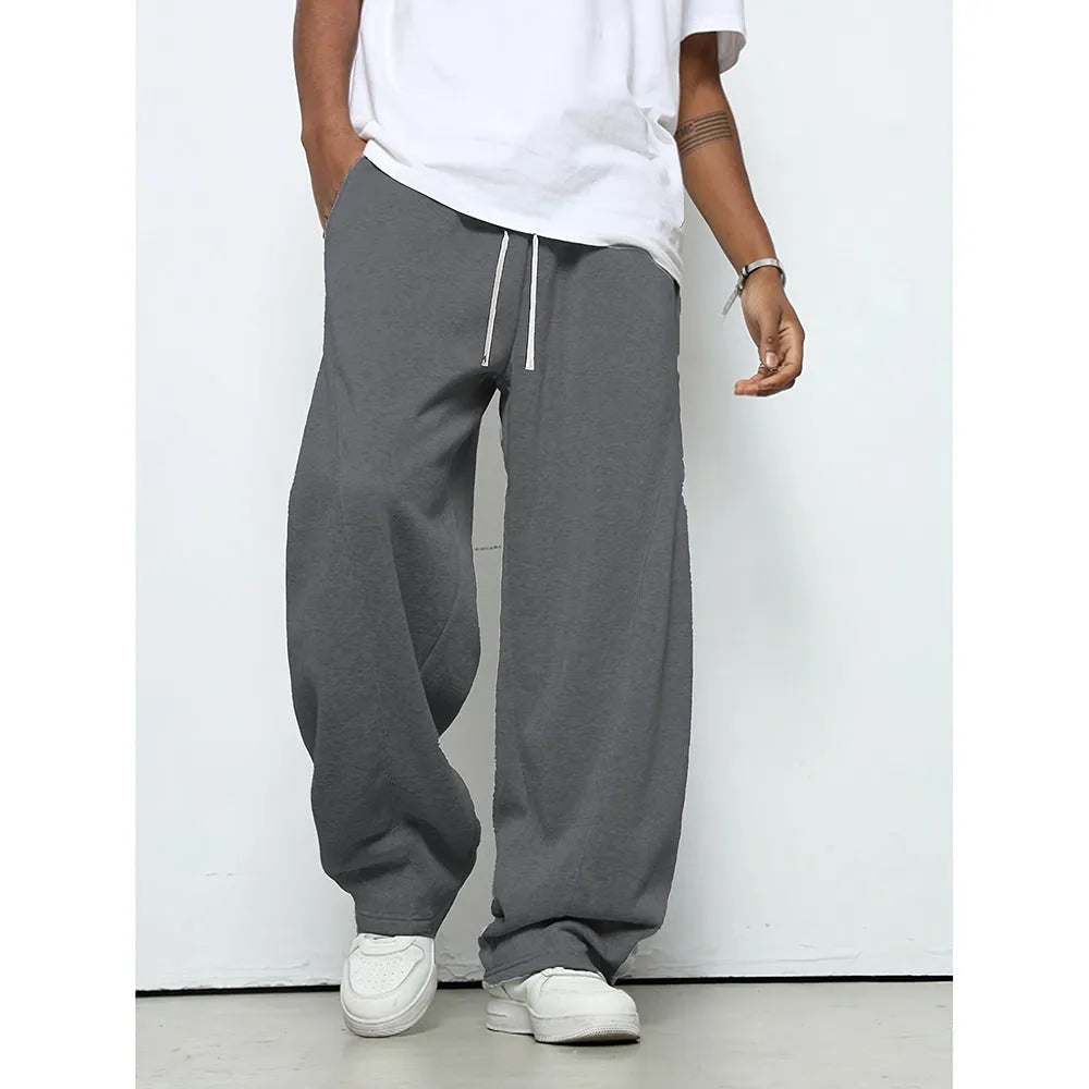 Men's straight-leg casual trousers in black with a micro-elastic drawstring waistband.