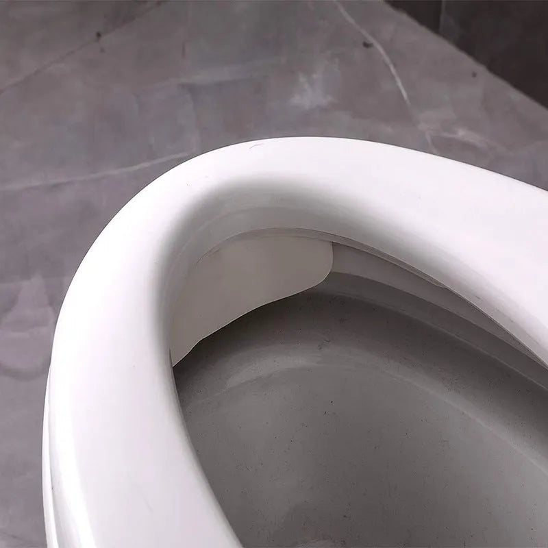 White PVC toilet training board with urine splash guard for children's potty training