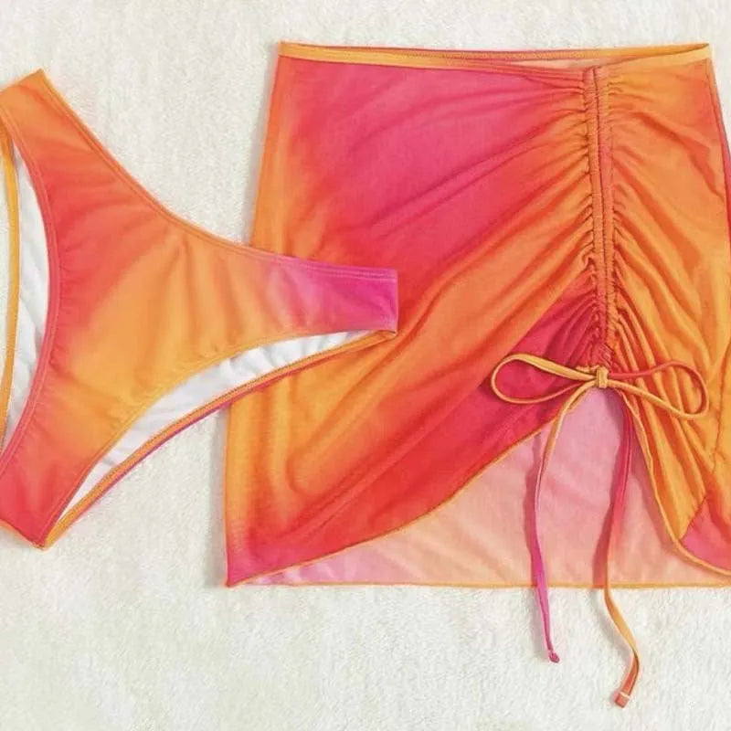 Orange gradient print women's three-piece bikini with hollow suspenders and a loop buckle.