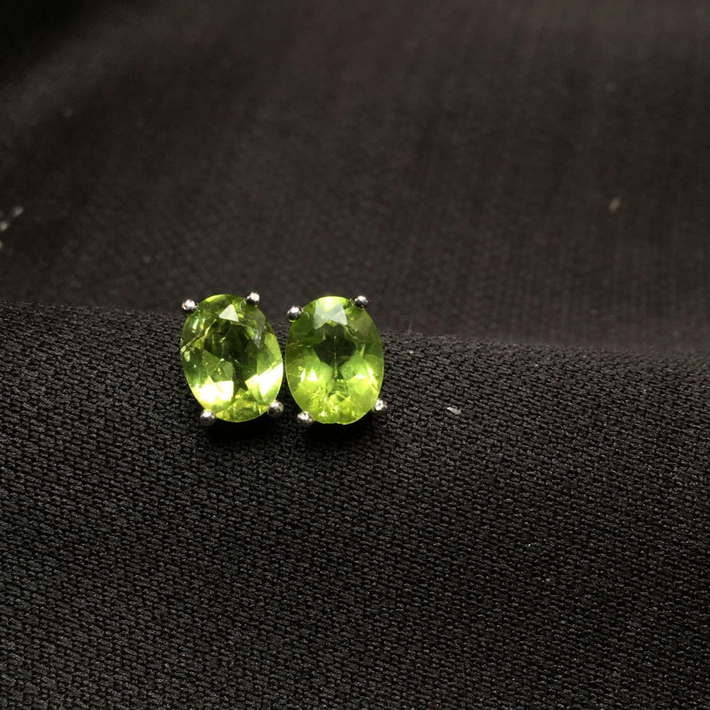 Grass green natural olivine stud earrings in S925 sterling silver with 6×8mm elliptical stones