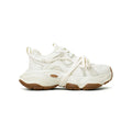 Women's beige and white platform sneakers with round toe and front lace-up design on a composite sole.