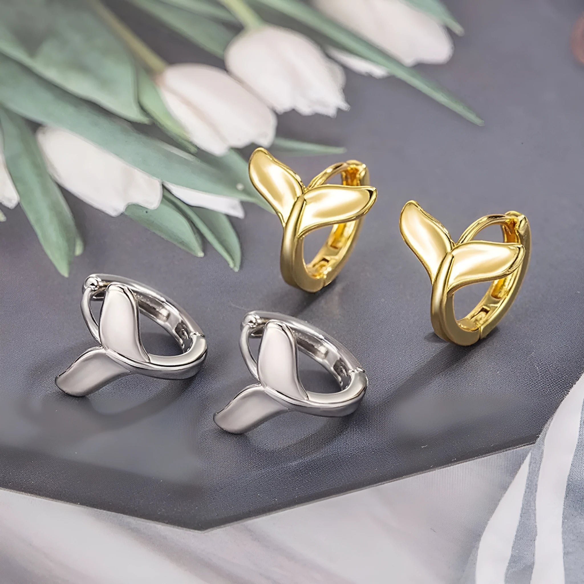 Women's fashion fishtail earrings in white gold and yellow gold colour options